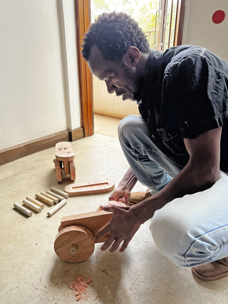 Nairobi roller skates, David Thuku while assembling Nairobi roller skates