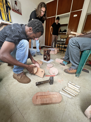 Nairobi roller skates, David Thuku while assembling Nairobi roller skates